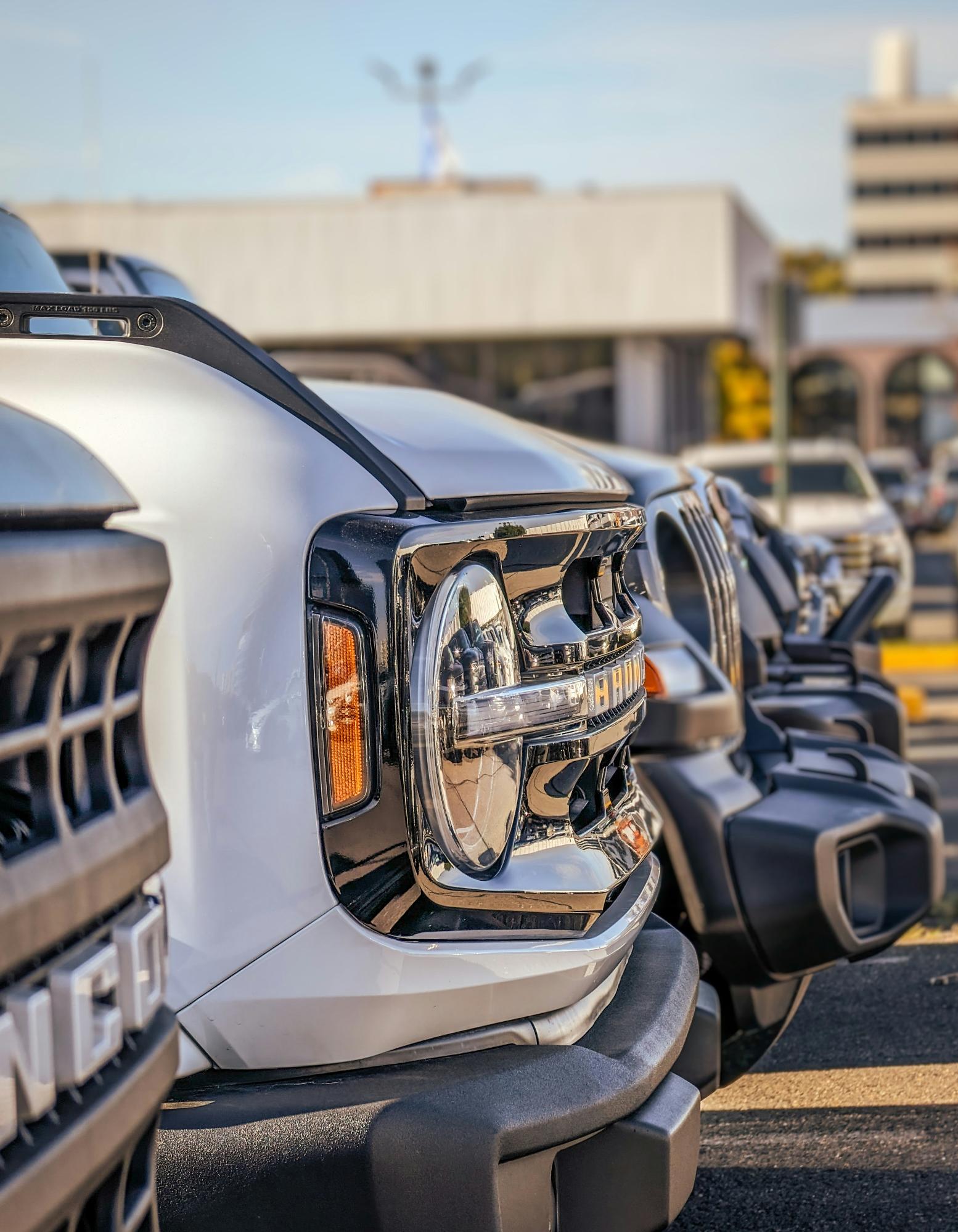 Multiple tow trucks lined up for comparing local towing companies