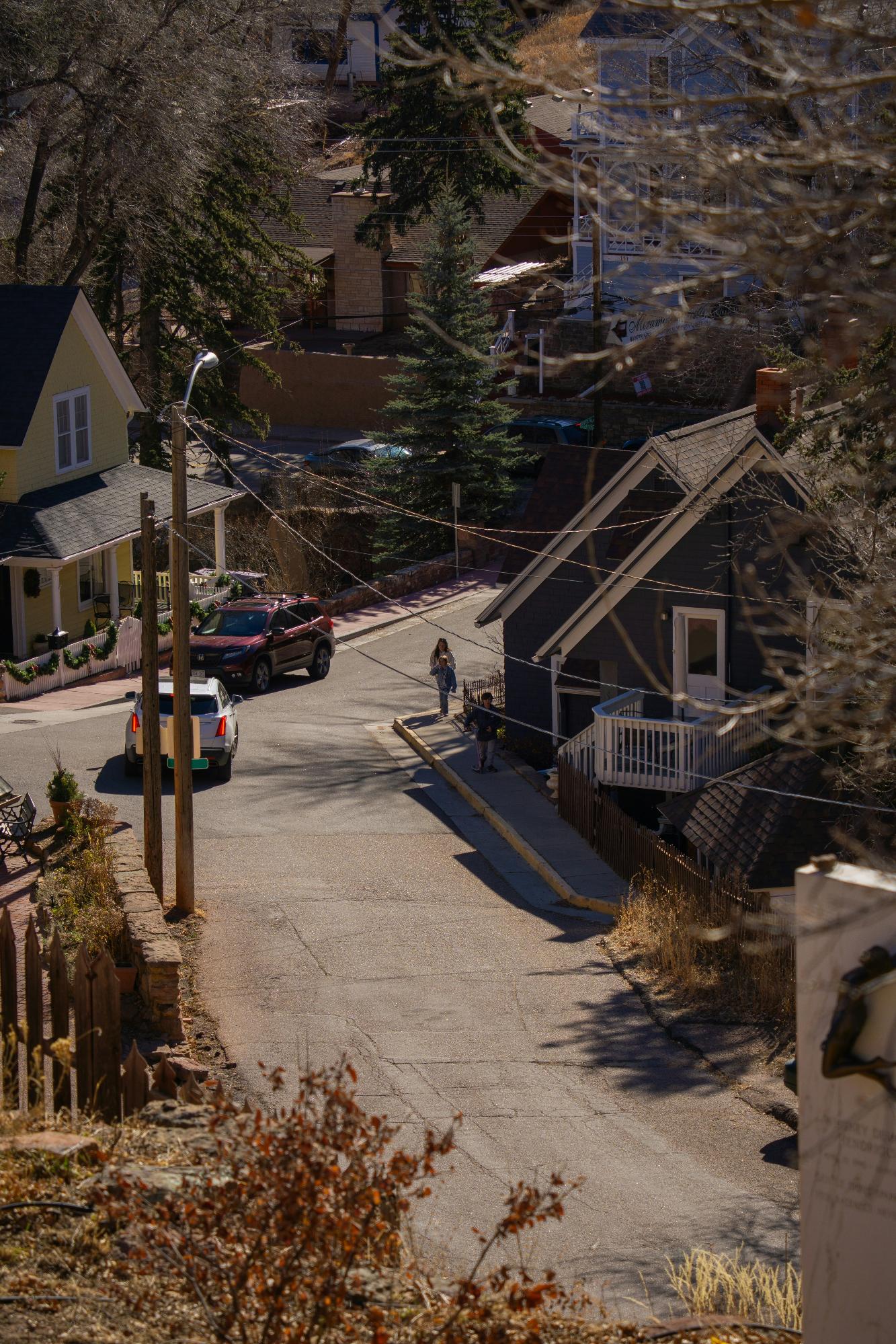 Local tow truck operating in a neighborhood street