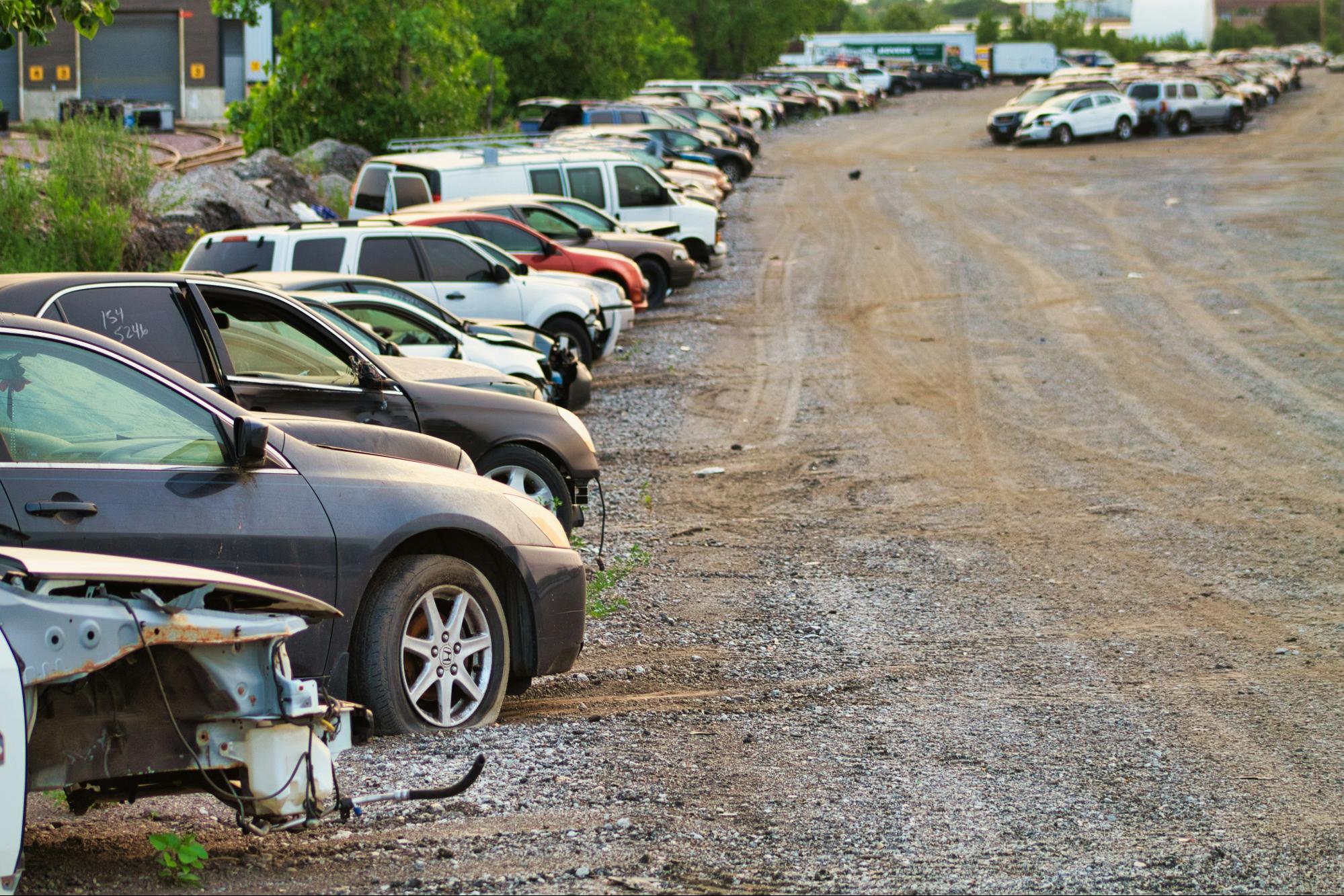 Tow yard with several stored vehicles awaiting pickup