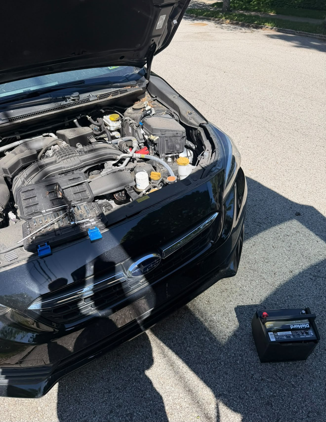 Battery replacement on a black Subaru in Columbus, OH