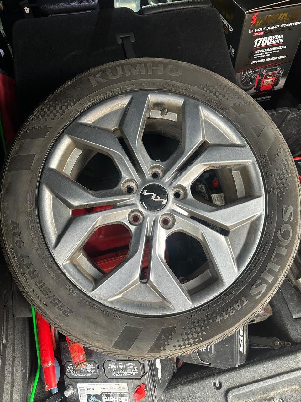 Kumho Solus TA31+ tire on an alloy wheel, sidewall reading 215/55R17 94V